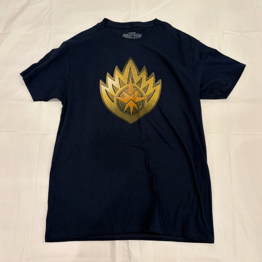Marvel Black Tee with Gold Emblem